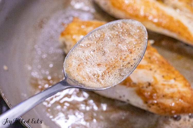 spoon lifting up some brown butter