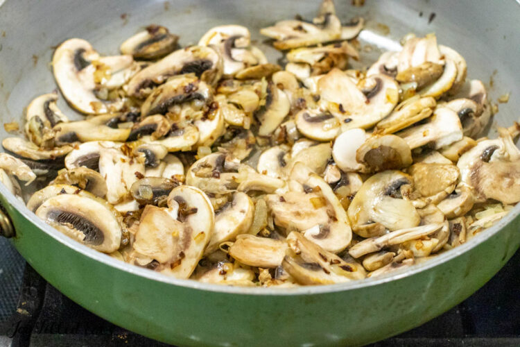 sauteed mushrooms in skillet