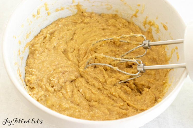 batter in bowl with hand mixer