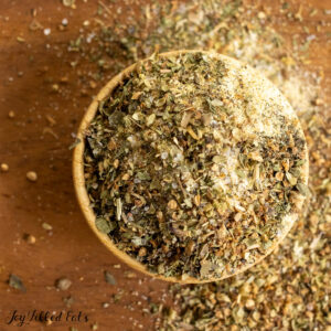 greek seasoning in tiny wooden bowl