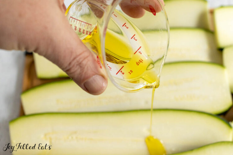 olive oil being drizzled on