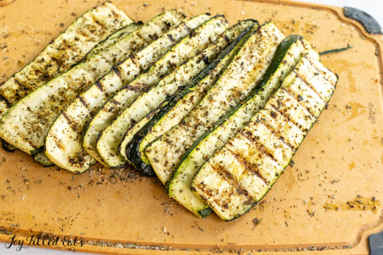 grilled greek zucchini on cutting board