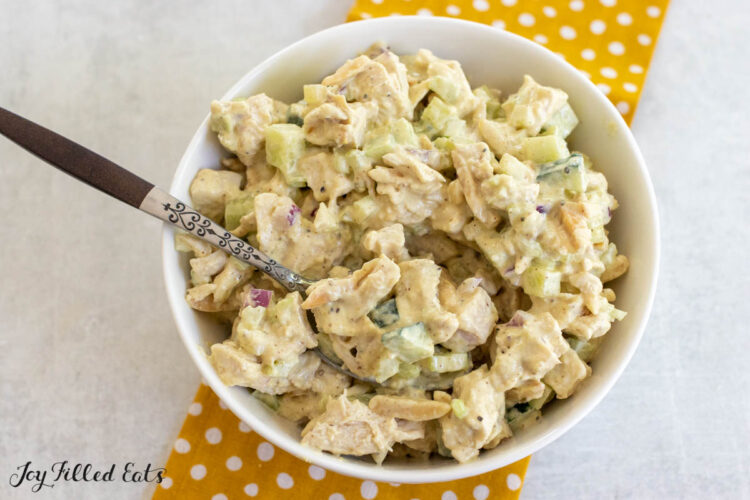 honey mustard chicken salad recipe in serving bowl with spoon