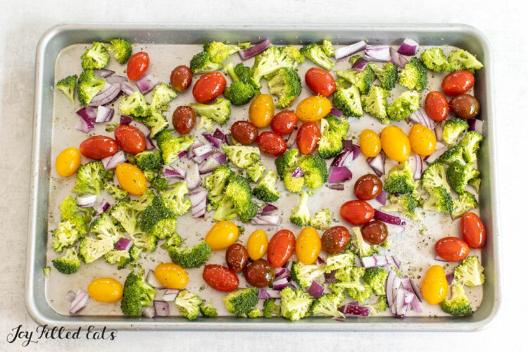 raw vegetables on baking tray