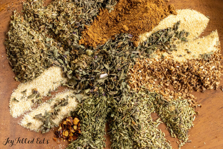 tuscan seasoning herbs and spices in design on plate