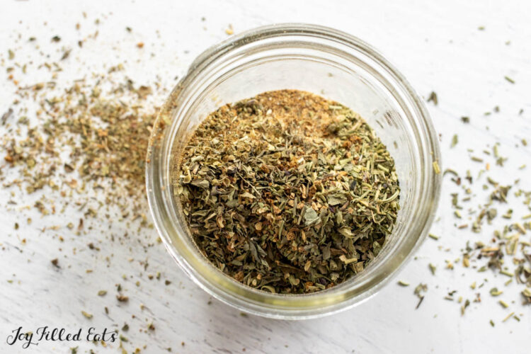 tuscan seasoning recipe in glass jar from overhead