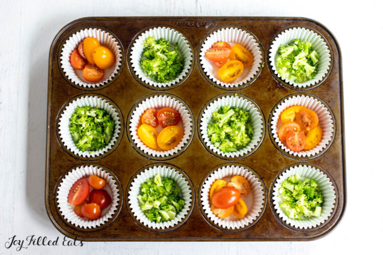 chopped vegetables in muffin tin cups