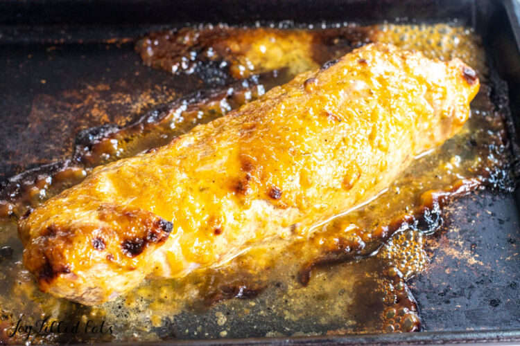 baked honey mustard pork tenderloin on baking tray
