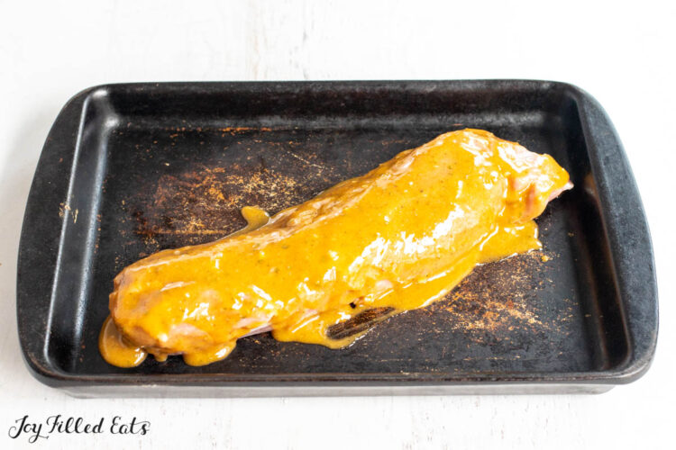 sauce covering pork tenderloin