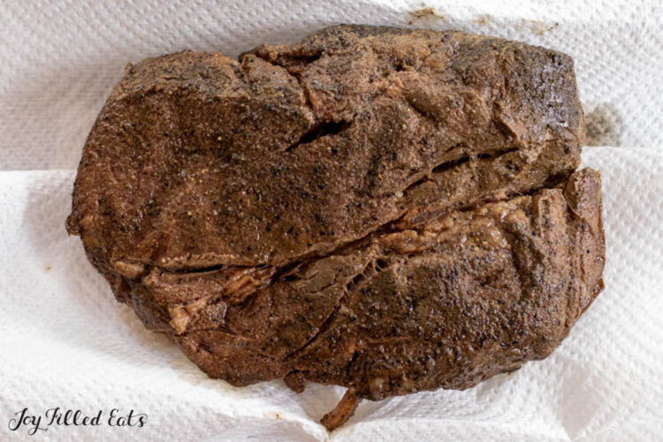 beef roast on paper towels