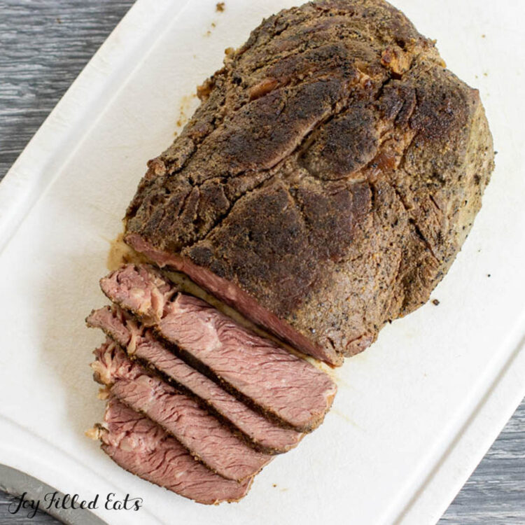 sous vide beef chuck roast sliced on cutting board